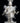 Front view of, "Little Fancy Dancer," cast paper sculpture by Patty Eckman featuring a young Native American dancing in full regalia.